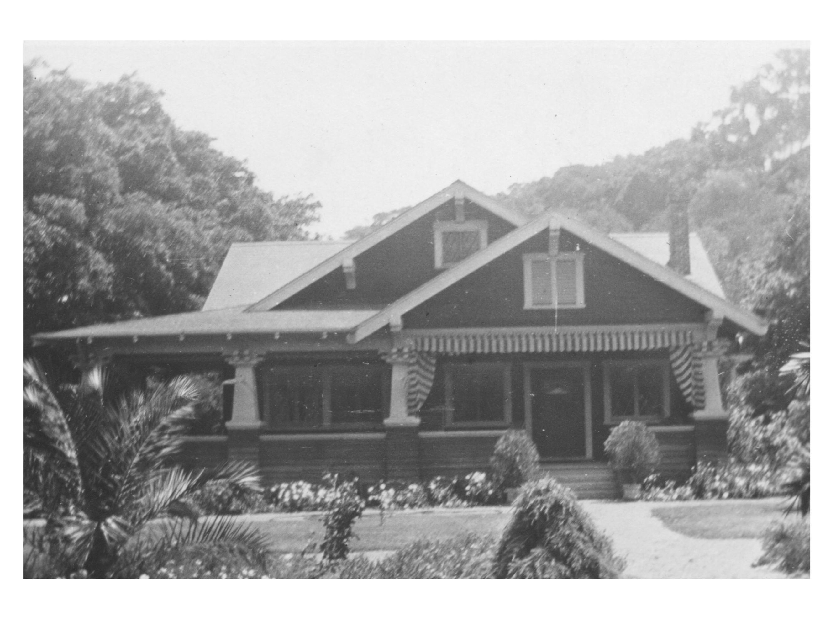 black and white photo of the Kolb house in summer