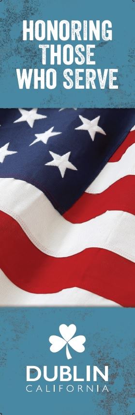 Banner with the American flag stating, "Honoring Those Who Serve."