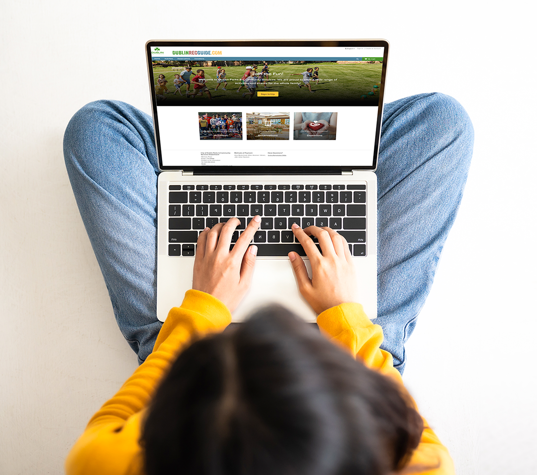 person on laptop computer browsing www.DublinRecGuide.com