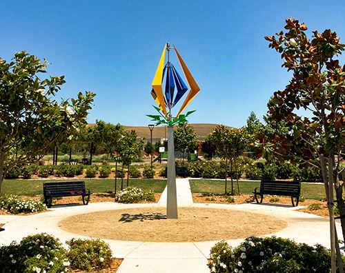 Diamonds in the Wind - 18' kinetic stainless steel sculpture, center of Sean Diamond Park  