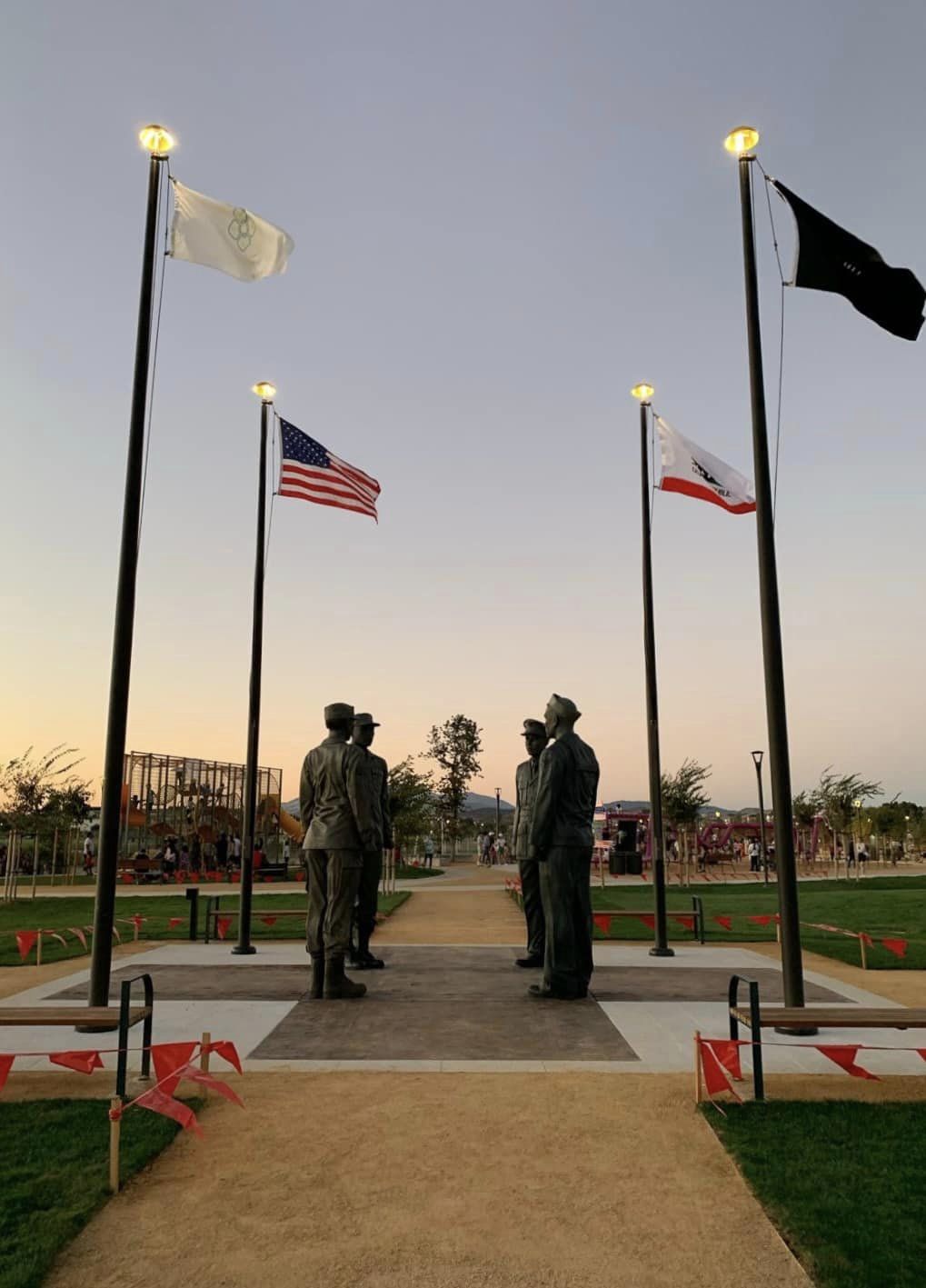 Veterans Art at Don Biddle Park at dusk